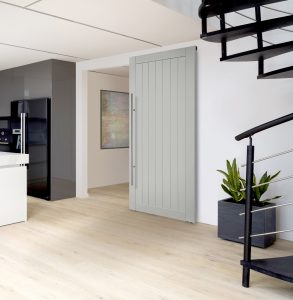 modern loft apartment with red brick wall white kitchen furniture wooden floor and mezzanine